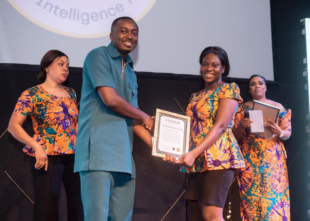 Nana Adjoa receiving outstanding teacher awards Ghana