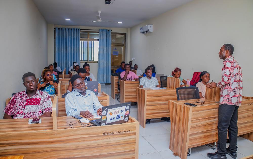 Dr. Nicholas Commey teaching business plan development