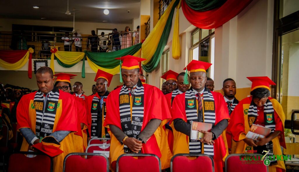 Graduates throwing caps in celebration