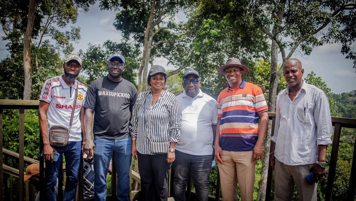 Gambian lawmakers walking through Kakum National Park forest floor